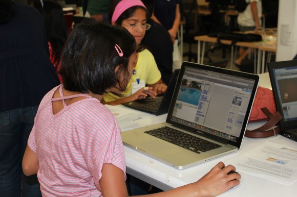 Students learning Scratch